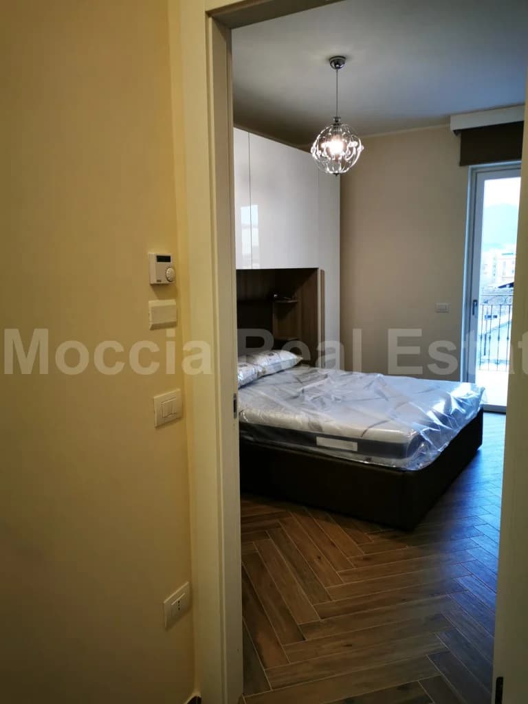 Bilocale Arredato con Box auto nuova costruzione in centro - foto 21