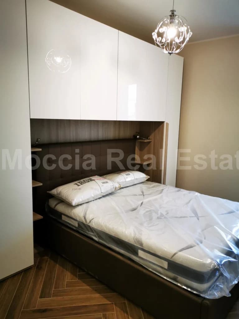 Bilocale Arredato con Box auto nuova costruzione in centro - foto 23