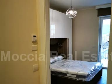 Bilocale Arredato con Box auto nuova costruzione in centro - foto 21
